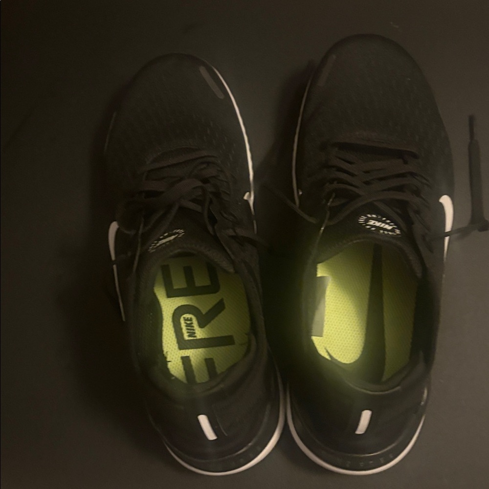 Nike Women’s Black and White walking shoes.